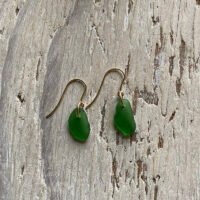 Green sea glass on gold earrings